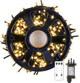 Spool of LED string lights with remote control on a white background